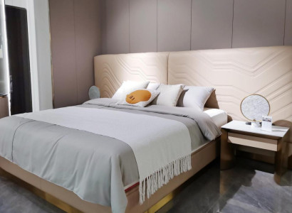 Elegant double bed. Luxurious bedroom bed. Stylish bed